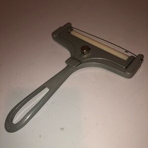 Vintage aluminum adjustable Cheese Slicer with Wire. Collectible kitchenware